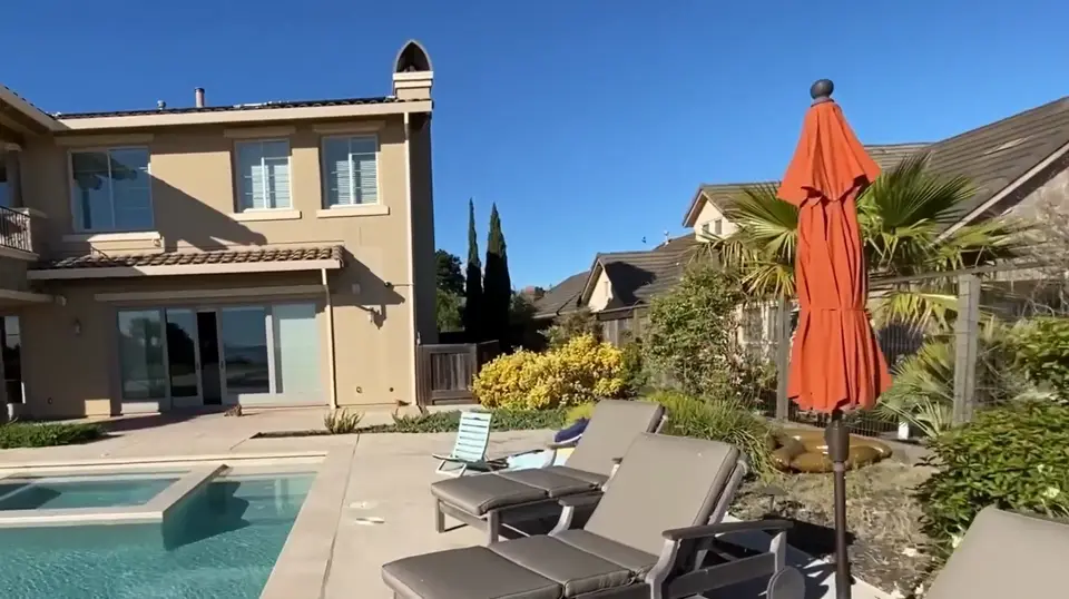 Backyard pool deck before renovation